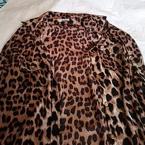 Leopard print Tunic length. Button down blouse